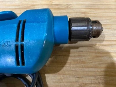 Taladro eléctrico reversible Makita 6404 3/8" velocidad variable Foto 1 de 4