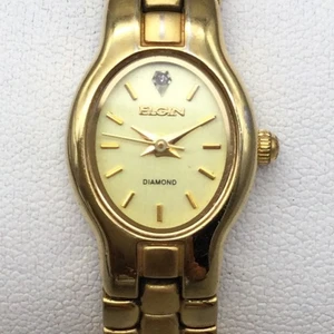 Reloj Elgin Mujer Tono Dorado Acento Diamante 16mm Esfera Ovalada Batería Nueva 7.5" - Imagen 1 de 15