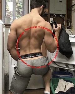 Shirltess Man in his Garage Laundry Room - Picture 1 of 1