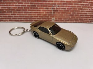 LLAVERO para PORSCHE 944 TURBO SPORT 1989 ORO COCHE LLAVERO ANILLO CORDÓN - Imagen 1 de 2