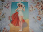 Vintage PIN-UP Bright Colors REDHEAD IN WHITE SWIMSUIT ON BEACH Red Blanket