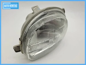 Renault Twingo I 1 (C06) Headlamp Left (glass) 20-5734 / 7701046215 - Picture 1 of 14