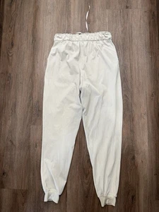Jogger Lululemon Stretch Luxtreme tiro alto talla 6 marfil defecto mancha - Imagen 1 de 9