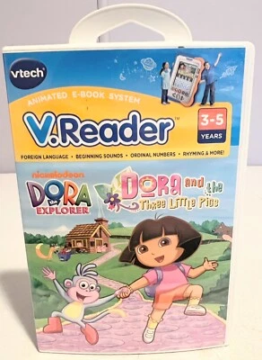 VTech V.Reader Animated E-Book System Book, Dora “ Dora & The Three Little Pigs” - Image 1 of 3