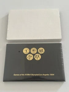 1984 LOS ANGELES OLYMPICS TRANSIT TOKEN COIN SET w/24 COINS Sealed - Picture 1 of 1