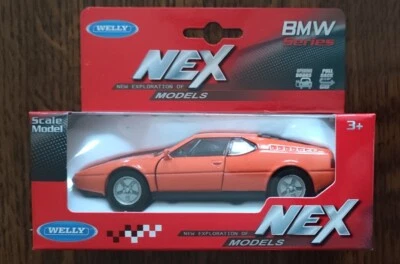 Superbe BMX M1  Orange 70's - Metal Environ 1/43eme - Welly - Neuve en boite - Photo 1/2