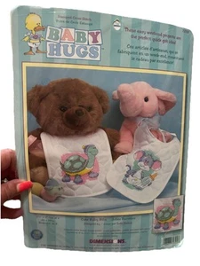 VTG Dimensions Baby Hugs Stamped Cross Stitch Kit Cute Baby Bibs # 72725 - Picture 1 of 3