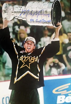 MIKE MODANO AUTOGRAPHED DALLAS STARS 16x20 PHOTO INSCRIBED 99 CUP CHAMPS - Image 1 of 2