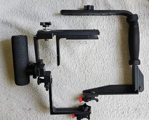 Stroboframe + Newton flip 35mm camera flash brackets.  Benefits Charity 100% - Picture 1 of 8