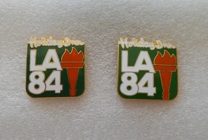 Juego de 2 prendedores vintage 1984 patrocinador de los Juegos Olímpicos de Verano Holiday Inn E.U.C. - Imagen 1 de 2