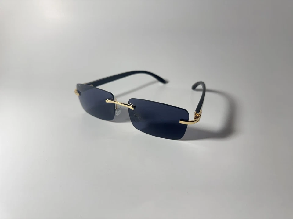 Gafas de sol gris oscuro tinte rectangular puffs marco dorado sin montura con estuche  Foto 1 de 3