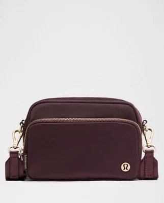 NWT LULULEMON  EVERYWHERE CROSSBODY BAG METAL HARDWARE 2L BLACK PLUM / GOLD - Image 1 of 4