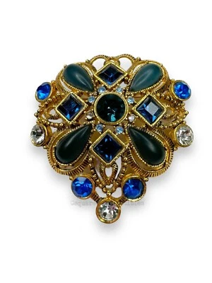 Broche cabujón acrílico y cristal facetado transparente azul tono dorado Foto 1 de 4