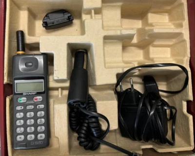 SHARP TQ-G450 GSM Funzionante completo di scatola e accessori Italiano - Immagine 1 di 4