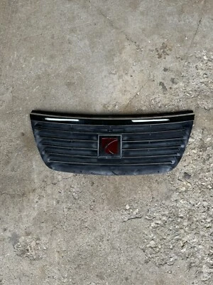 Saturn Ion 2003-2007 2,2 L rejilla OEM con emblema Foto 1 de 4