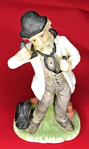 ENESCO Family Doctor listening to Stethoscope Ceramic Figurine - Picture 1 of 3