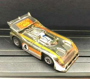 AFX - Porsche 510k Can-Am Gold Chrome w/ G-plus Speed Shifter Chassis w/ guide - Picture 1 of 3