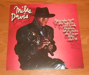 Póster Miles Davis You’re Under Arrest plano de 2 caras 1985 promoción 12x12 raro jazz - Imagen 1 de 2