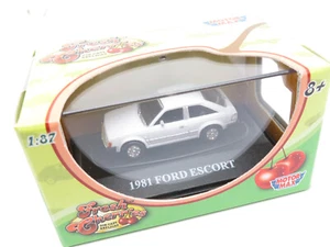 334HO /13 - MotorMax Fresh Cherries H0 73950 - 1981 Ford Escort weiß top in OVP - Bild 1 von 3
