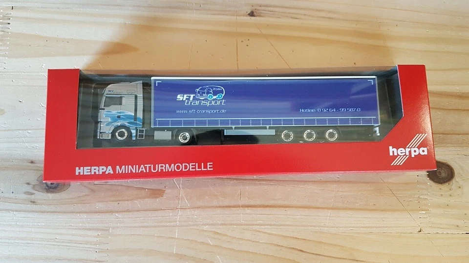 Herpa 311861 - 1/87 Renault T Semi-Remorque " Expédition Philipp / Sächs. Noir "