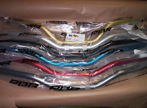 MANUBRIO PIEGA ALTA PBR D.22 NERO ORO SILVER FUME BLU ROSSO - Imagen 1 de 2