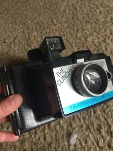 POLAROID LAND CAMERA INSTANT " THE CLINCHER " TAKES FLASH CUBES - Picture 1 of 7