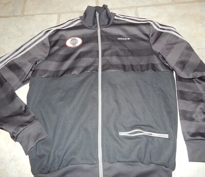 ADIDAS  VINTAGE  VERY RARE WORLD WIDE WORLD MARK GLOBE    TRACKSUITE! - Image 1 of 4