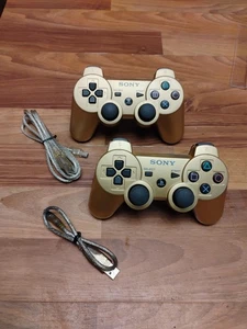 2X Controladores inalámbricos Sony PlayStation 3 PS3 Gold Dualshock 3 OEM LEER DESCRIPCIÓN - Imagen 1 de 18