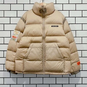 TAMPÓN DE NAILON TRATADO HERON PRESTON BEIGE ÚLTIMAS TALLAS S M L - Imagen 1 de 8