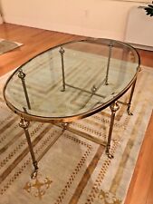 HOLLYWOOD REGENCY FRENCH BRASS HOOF FEET OVAL INSET BEVELED GLASS COFFEE TABLE