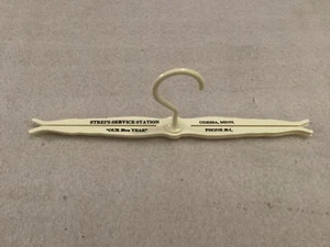 VINTAGE PLASTIC FOLDING ADVERTISING HANGER - Picture 1 of 4