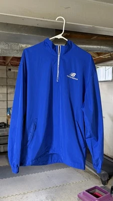 Sudadera para hombre azul real empacable New Balance Athletics cuarto cremallera Foto 1 de 4