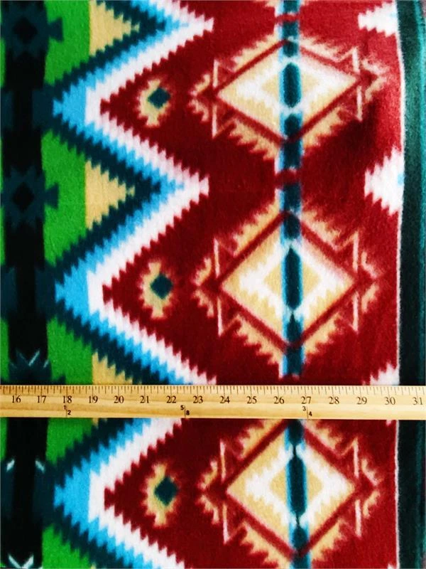 Tela estampada polar AZTECA IKAT - BLANCO, NEGRO, TURQUESA / 58" de ancho / por yarda Foto 1 de 1