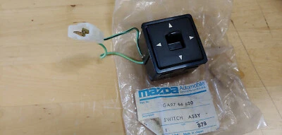 Interruptor de espejo retrovisor eléctrico Mazda 626 nuevo (GA97-66-600) 1986 y 1987 Foto 1 de 3