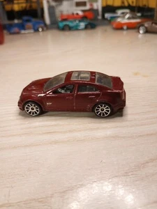 Hot Wheels 2010 010 New Models 10/44 '09 Cadillac CTS-V Metalflake Maroon Red - Picture 1 of 24