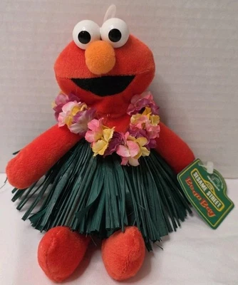 Juguete de peluche vintage Applause 1997 Plaza Sésamo Hula y Lei Elmo bolsa de frijoles con etiquetas Foto 1 de 4