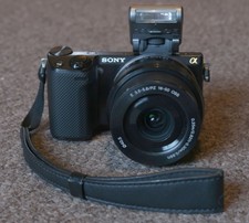 Sony NEX-5R + 50mm f1.8 + 30mm f1.4 + 16-50mm + lots of extras