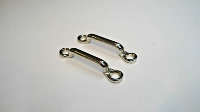 ¡2 SOPORTES DE CORREA A CUADROS PARA PUERTAS! PARA COSECHADORA INTERNACIONAL SCOUT 2 II 800 80 ETC Foto 1 de 2