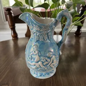 VTG IRIDESCENT PASTEL BLUE RAISED EMBOSSED CHERUB AND GRAPE VINE PITCHER SIGNED - Picture 1 of 24