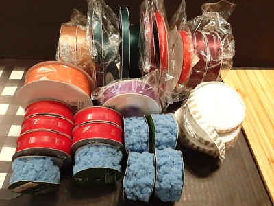 29 ROLLS RIBBON LOT RED, COFFEE , BURGUNDY, GREEN, PURPLE , ORANGE , GOLD, BLUE - Image 1 of 4