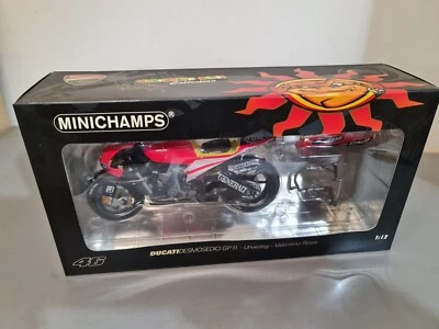 Valentino Rossi. Ducati Desmosedici GP11. Unveilinh 2011.  Minichamps 1/12. - Image 1 of 4