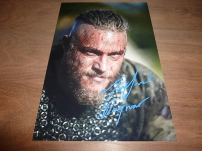 TRAVIS FIMMEL signed 12X8 photo VIKINGS + COA - Image 1 of 2