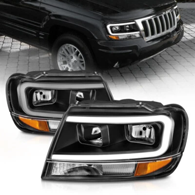 Faros de cristal para Jeep Grand Cherokee ANZO 1999-2004 - con barra de luz negros Foto 1 de 4