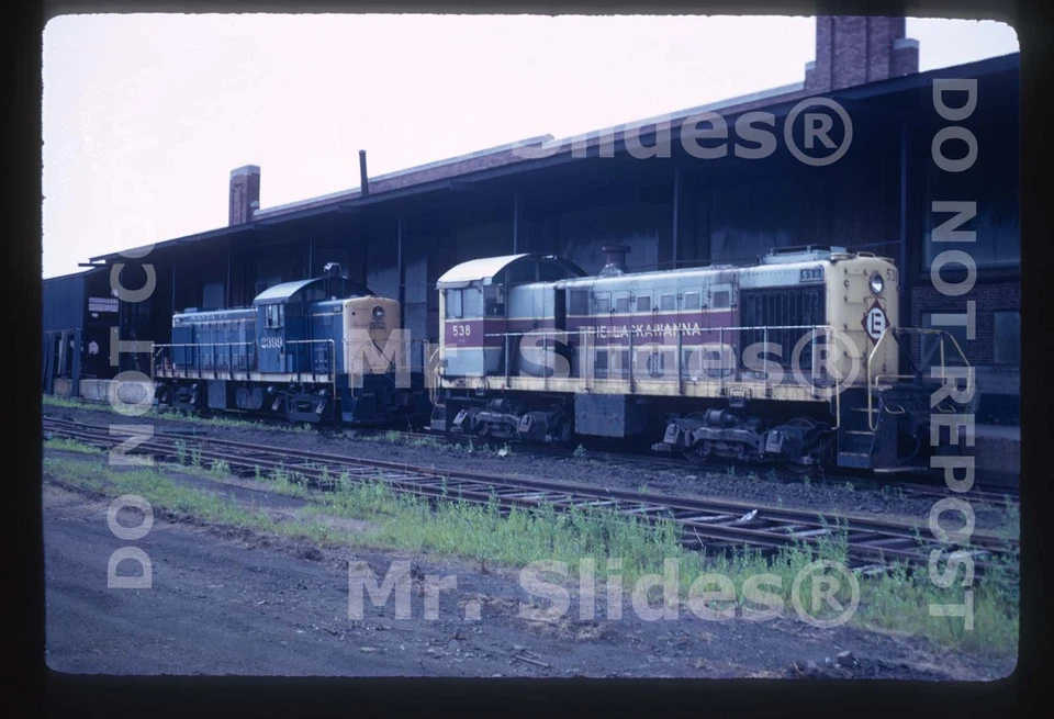 Original Slide EL Erie Lackawanna ALCO S2 538 & ATSF RS1 2399 At PNC 1973 - Image 1 of 1