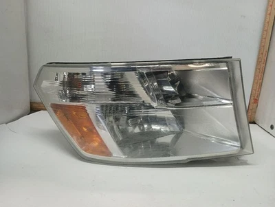 Driver Left Headlight from 2011 Dodge Ram 1500 12278213 - Image 1 of 4
