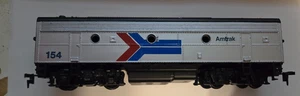 Motor diésel Atlas HO F-3 B-Unit Amtrak 154 DMY - Imagen 1 de 2