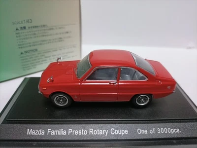 Modelo de coche cupé rojo giratorio Ebbro 1:43 Mazda Familia Presto Foto 1 de 4