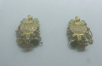 Pendientes de clip Kirks Folly Angel/Hada tono dorado con dijes Foto 1 de 4