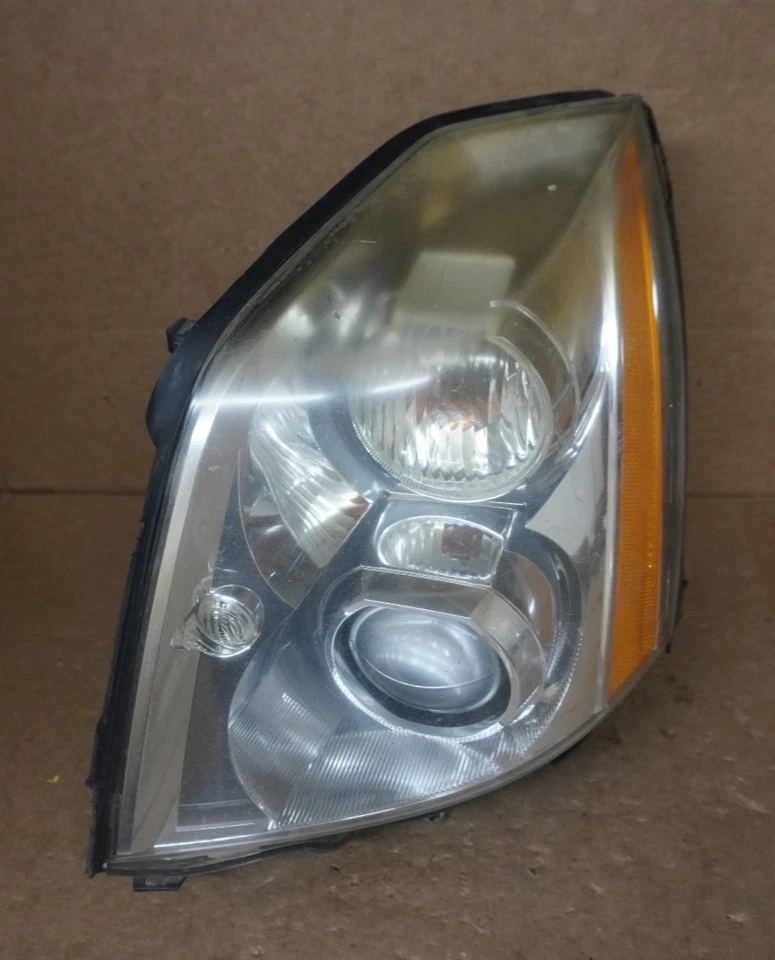 Faro de xenón del lado izquierdo del conductor Cadillac DTS 2006 2007 2008 2009 2010 2011 FABRICANTE DE EQUIPOS ORIGINALES Foto 1 de 4