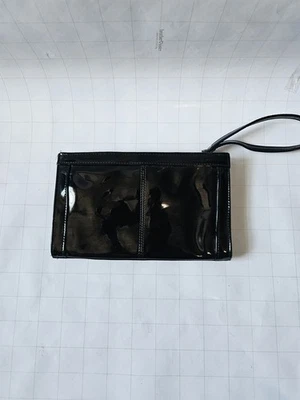 Muñequera clutch Bueno charol negro imitación cuero Foto 1 de 4